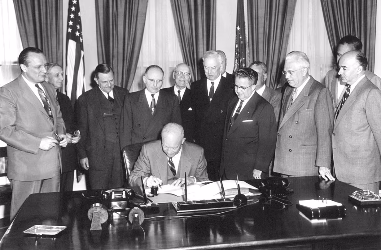 May 6, 1954 - Dwight D. Eisenhower signs H.R. 8127, An Act to amend and supplement the Federal-Aid Road Act approved July 11, 1916. [72-849-3]